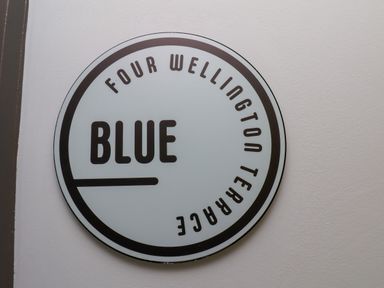 A sign indicating Four Wellington Terrace and Blue