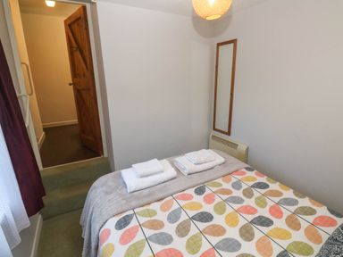 A bedroom with a bed and towels on it at Chyancrowse in Gulval