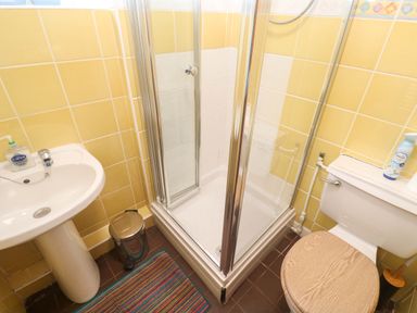 A bathroom with a sink shower and toilet at Chyancrowse in Gulval
