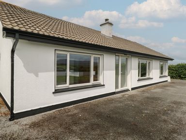 A house with windows and a door at Tí Chonaill in 