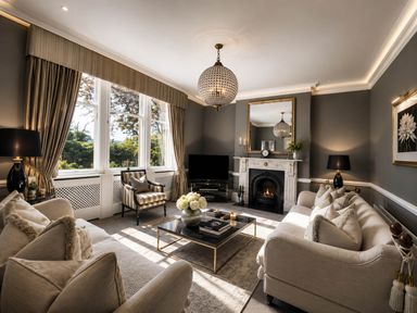 A living room with a sofa and coffee table at Chowdene Lodge Estate