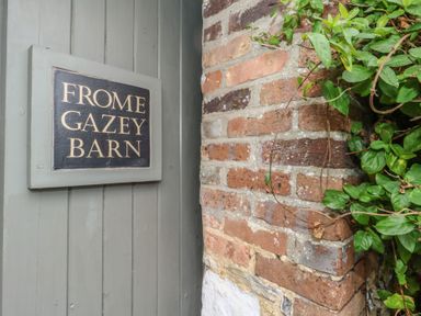 A sign reading Frome Gazey Barn on a brick wall at Frome Gazey Barn in Frampton