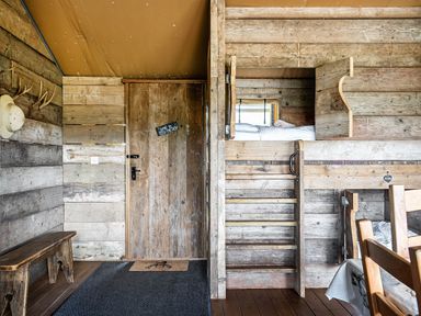 A bedroom with a bunk bed and wooden furniture at Luxury Safari Lodge Sleeps 4/6 Deer Park Dogs Ok Zeal Monachorum near Bow
