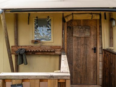 An entryway with a wooden door and coat rack at Luxury Safari Lodge Sleeps 4/6 Deer Park Dogs Ok Zeal Monachorum near Bow