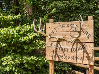 A sign with antlers at Wootten Deer Park & Safari Lodges Zeal Monachorum near Bow