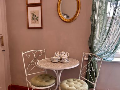A dining room with a table and chairs at Downton II in Alnwick