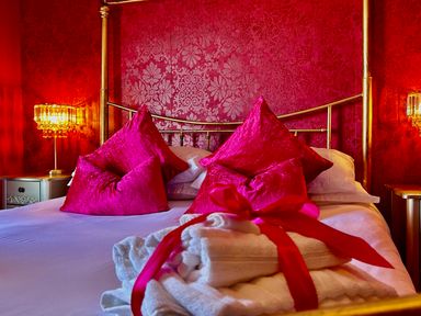 A bedroom with a bed and pillows at Downton II in Alnwick