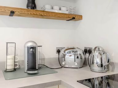 A kitchen with coffee maker and kettle at Luxury 2 bedroom Lodge in rural lincolnshire