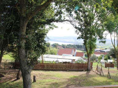A view of houses and gardens from a distance at Owls Roost in Robin Hood’s Bay