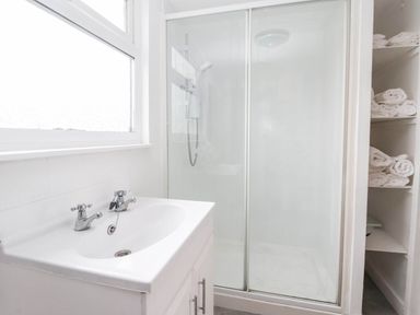 A bathroom with a sink and shower at Westgate Willows in Nafferton