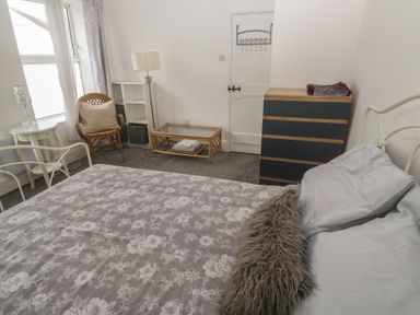A bedroom with a bed and furniture at 1 St. Day Road Redruth