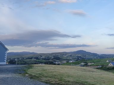 A view of mountains and houses at Sliabh League Mountain Lodge TEILEANN near Kilcar, County Donegal