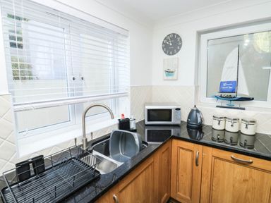A kitchen with a sink and appliances at 2 Inglewood Apartments in Dartmouth