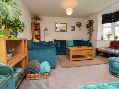 A living room with a sofa and coffee table at Manning's View in Barnstaple