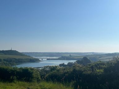 A view of a river and bridge surrounded by hills at 2 Bedrooms overlooking Little Petherick Creek Little Petherick