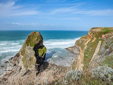 A view of a rock formation near the ocean at Spacious 3 Bed House Sleeps 6 Parking Wifi Newquay