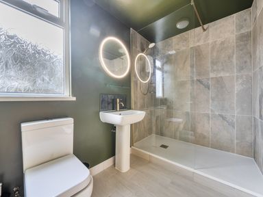 A bathroom with a shower and sink at 1 Bedroom Apartment Sleeps 2 Pets Welcome in Carbis Bay