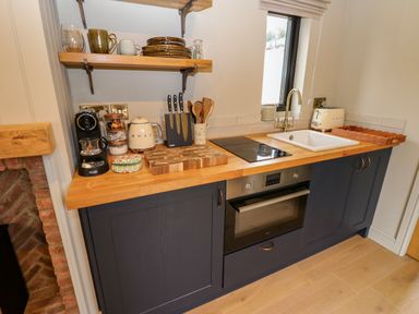 A kitchen with appliances and utensils at 2 West Dunkirk Neuk in Hexham