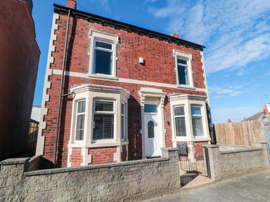 A house with windows and a front door at Portobell House in Bridlington