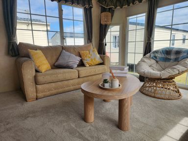 A living room with a sofa and a coffee table at Whitley bay parkdean resorts - 52 Beechfield, Whitley Bay