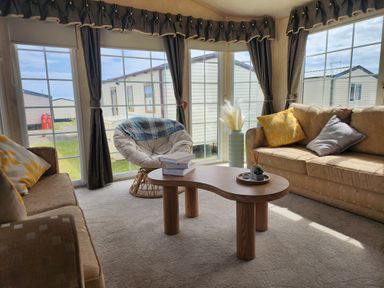 A snug with seating area and large windows at Whitley bay parkdean resorts - 52 Beechfield, Whitley Bay
