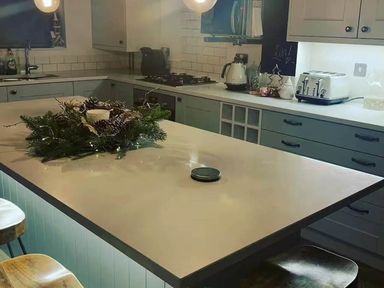 A kitchen with a countertop and appliances at 
