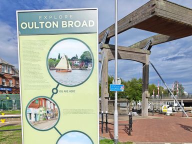 An information board and wooden structure at Oulton Broad