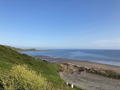 A coastal view with hills and water at Beautifully Presented 2 Bedroom Static Caravan in Monreith near Whithorn
