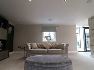 A living room with a sofa and coffee table at Northumberland Luxury Stays - The Chivits near Amble