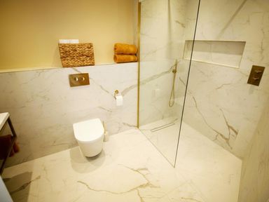 A bathroom with a shower and toilet at Newly Refurbished Cottage, sleeping 4 and Central in Berwick-Upon-Tweed