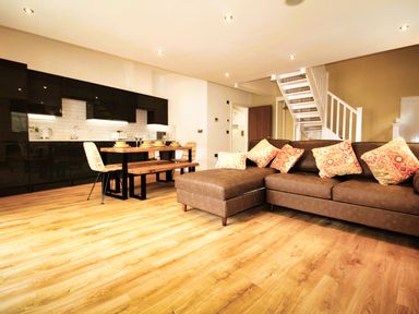 A living room with a dining area and kitchen at Newly Refurbished Cottage, sleeping 4 and Central Berwick-Upon-Tweed