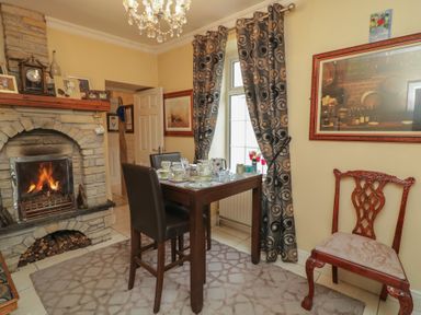 A dining room with a table and chairs at Bruckless Rest Fine Country Dining B&amp;B Bruckless