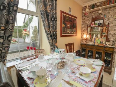 A dining room with a table set for eating at Bruckless Rest Fine Country Dining B&amp;B Bruckless