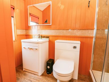 A bathroom with a sink and toilet at Calendonia Hut in West Mains near Haggerston