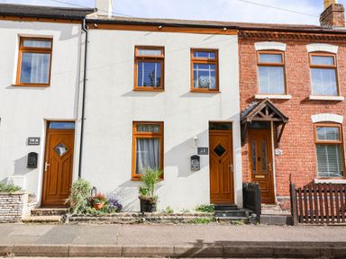 A row of houses with doors and windows at Severnwolf House in Gloucester