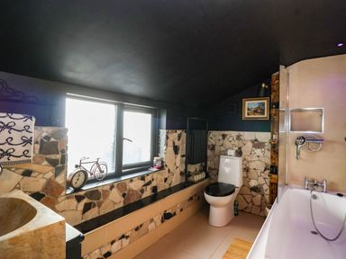 A bathroom with a sink and toilet at Severnwolf House in Gloucester