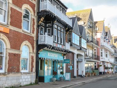 A view of storefronts along a street at 1 Embankment House Dartmouth