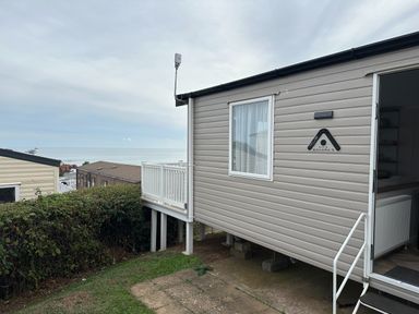 A mobile home exterior with sea view at Club Sahara in Sandy Bay, Exmouth