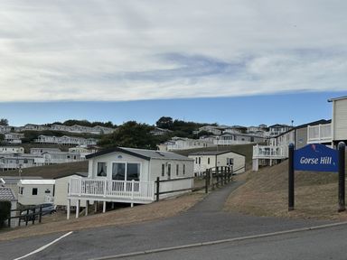 A view of caravans on a hillside at Gorse Hill, Sandy Bay, Exmouth