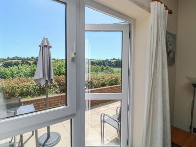 A door leading to an outdoor area at Egret in Kingsteignton