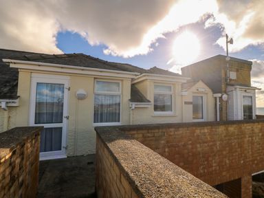 A rooftop area with doors and windows at Llywelyn in Trearddur Bay