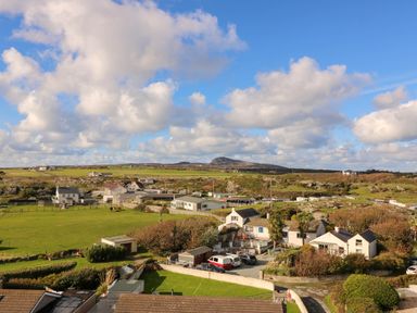 A view of houses and fields at Llywelyn in Trearddur Bay