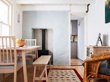 A dining room with a table and chairs at The Old Barn in Manchester