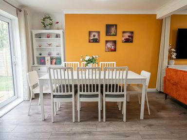 A dining room with table and chairs at The Old Barn in Manchester