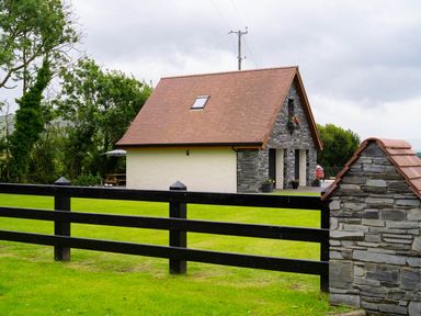 A house with a garden and fence at Limavady Cherry Tree Apartment, Sleeps 2 and Parking in Limavady