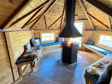 A room with a fireplace and seating areas at Jeannies retreat at little lake fb