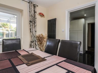 A dining room featuring a table and chairs at 19 Hailey Road