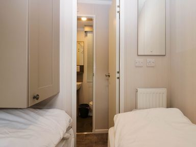 A bathroom with a sink and toilet visible at Lake It Easy, Troutbeck Bridge