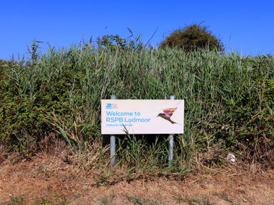 A welcome sign for RSPB Lodmoor nature reserve
