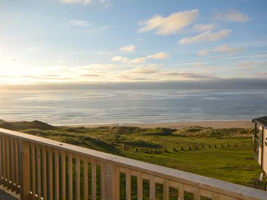 An outdoor view of ocean and beach at Perran Sands Holiday Park - 621 Chy-an-Mor Perranporth